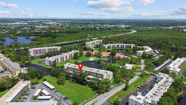 5920 80th St N Unit 308, Saint Petersburg, FL 33709 - drone / aerial view of apartment complex and a nearby body of water