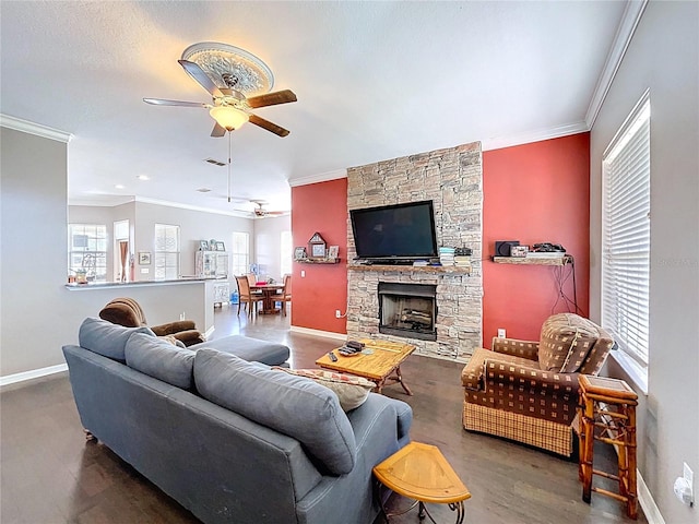 3108 Tom Matthews Rd, Lakeland, FL 33810 - living room with ceiling fan, ornamental molding, and a stone fireplace
