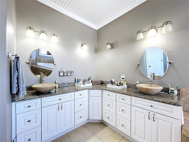 3108 Tom Matthews Rd, Lakeland, FL 33810 - bathroom featuring crown molding, double vanity, and tile patterned floors