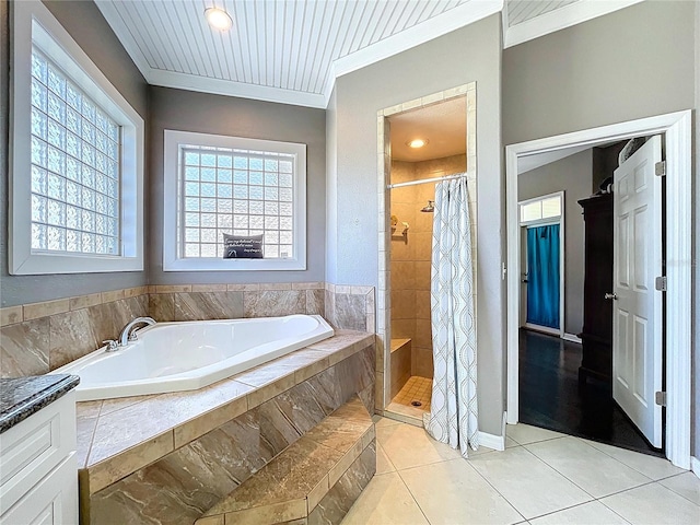 3108 Tom Matthews Rd, Lakeland, FL 33810 - full bath featuring a bath, ornamental molding, a shower stall, and tile patterned floors