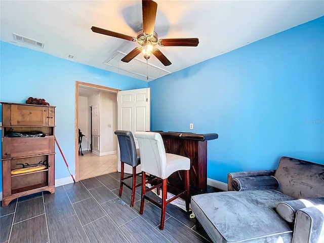 3108 Tom Matthews Rd, Lakeland, FL 33810 - home office with ceiling fan and a bar
