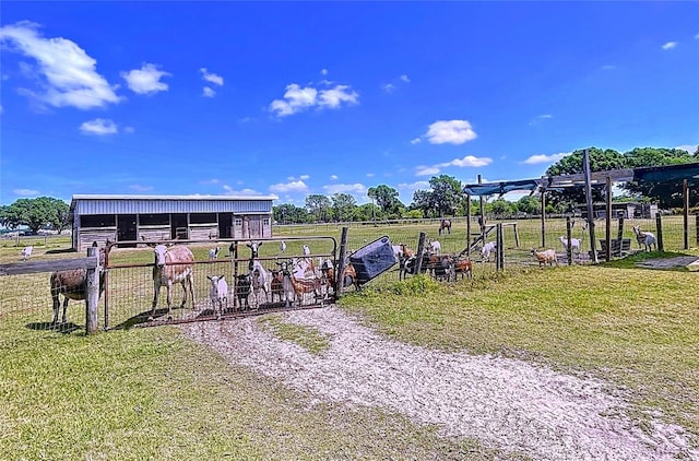 3108 Tom Matthews Rd, Lakeland, FL 33810 - view of community with an outdoor structure, a view of rural / pastoral area, an exterior structure, and a yard