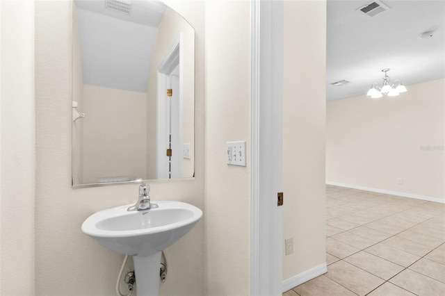 30151 Goodwick Way, Wesley Chapel, FL 33543 - bathroom featuring tile patterned flooring and baseboards
