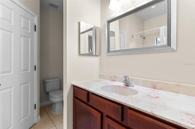 30151 Goodwick Way, Wesley Chapel, FL 33543 - bathroom featuring tile patterned flooring, vanity, and a shower