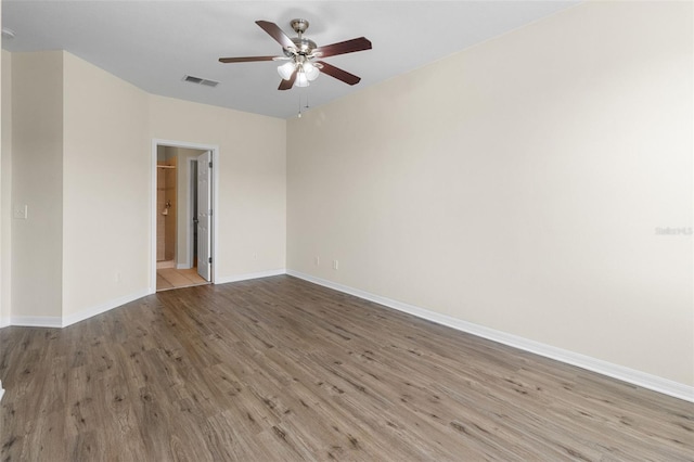 30151 Goodwick Way, Wesley Chapel, FL 33543 - unfurnished room featuring wood finished floors and a ceiling fan