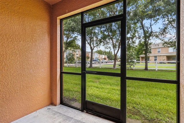 30151 Goodwick Way, Wesley Chapel, FL 33543 - unfurnished sunroom with a residential view