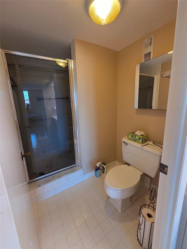 632 Edgewater Dr Unit 633, Dunedin, FL 34698 - full bathroom featuring tile patterned flooring and a stall shower