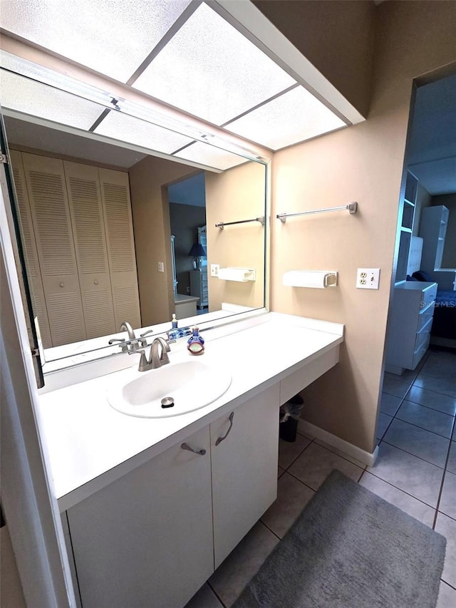 632 Edgewater Dr Unit 633, Dunedin, FL 34698 - bathroom with tile patterned flooring and vanity