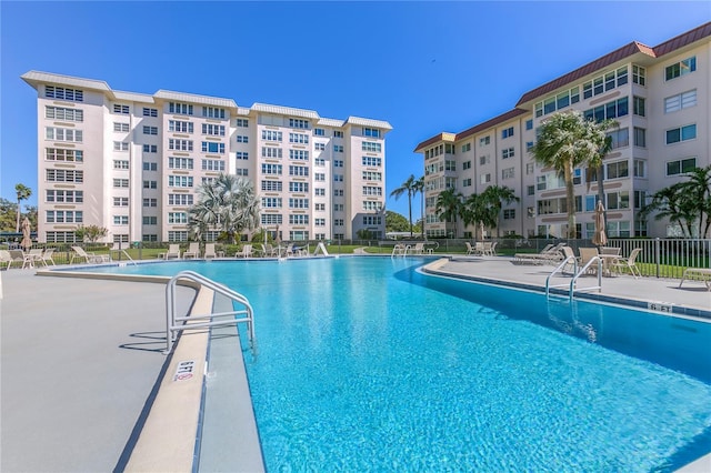 632 Edgewater Dr Unit 633, Dunedin, FL 34698 - community pool with a patio