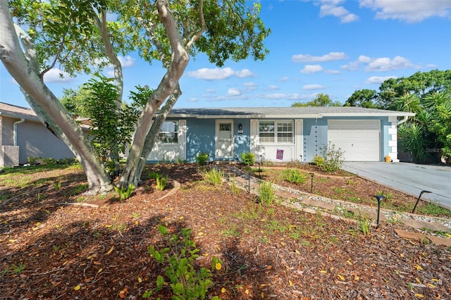 908 Toddsmill Trce, Tarpon Springs, FL 34689 - ranch-style home with an attached garage and concrete driveway