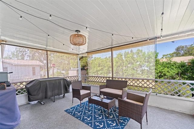 908 Toddsmill Trce, Tarpon Springs, FL 34689 - sunroom with outdoor lounge area and plenty of natural light