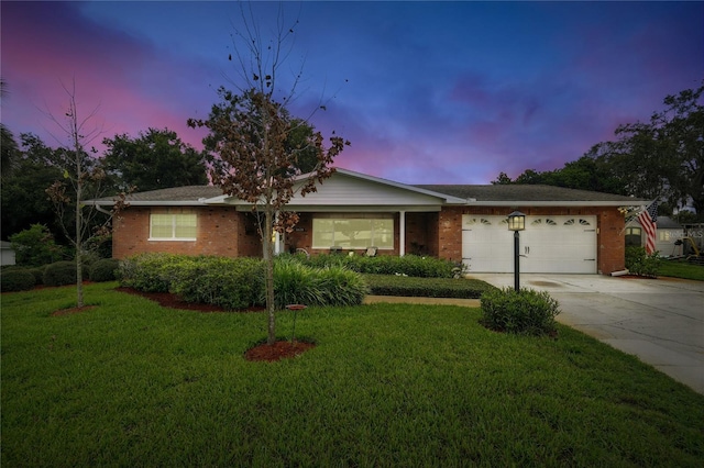 5628 Cypress St, Zephyrhills, FL 33542 - ranch-style house with driveway, a garage, a front lawn, and brick siding