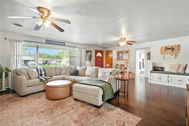5628 Cypress St, Zephyrhills, FL 33542 - living area featuring ceiling fan and dark wood-style floors