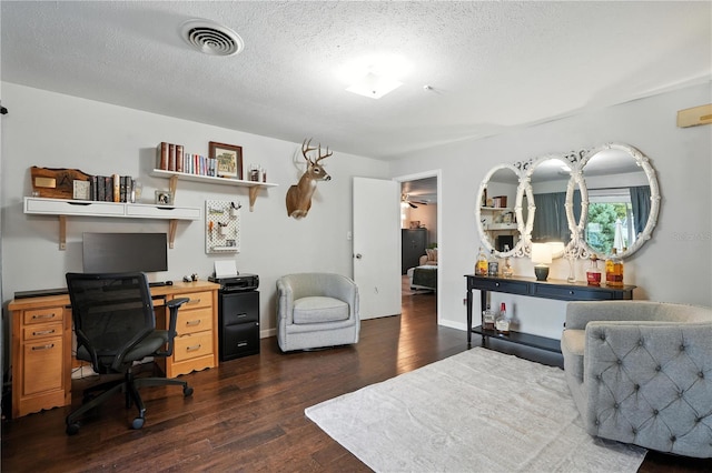 5628 Cypress St, Zephyrhills, FL 33542 - office featuring dark wood-type flooring and a textured ceiling