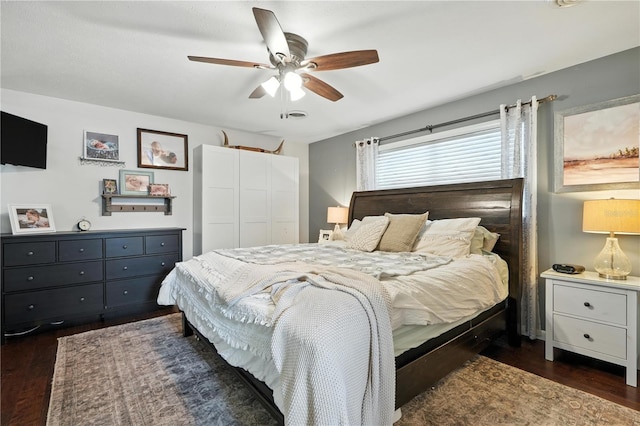 5628 Cypress St, Zephyrhills, FL 33542 - bedroom featuring dark wood-style floors and a ceiling fan