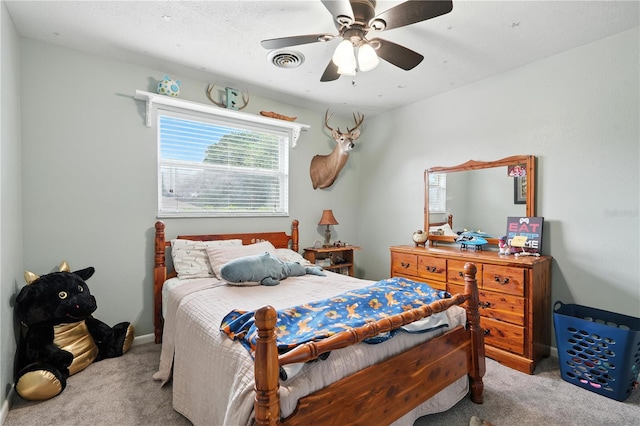 5628 Cypress St, Zephyrhills, FL 33542 - carpeted bedroom with ceiling fan