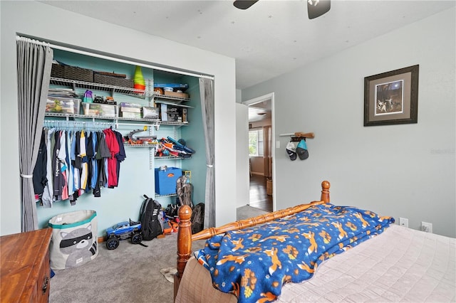 5628 Cypress St, Zephyrhills, FL 33542 - bedroom featuring carpet floors, a closet, and a ceiling fan