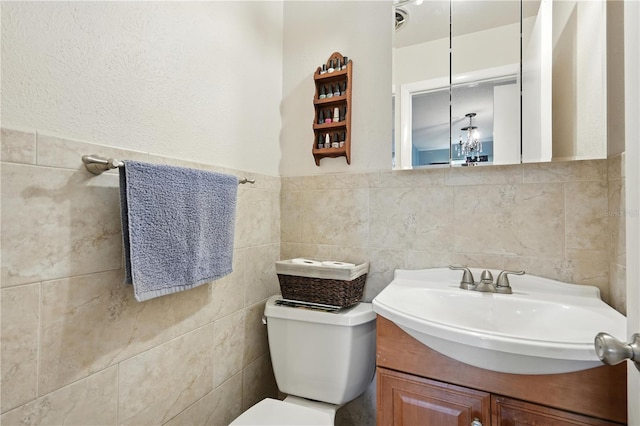 5628 Cypress St, Zephyrhills, FL 33542 - bathroom with vanity and tile walls
