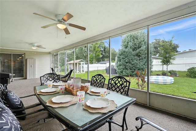 5628 Cypress St, Zephyrhills, FL 33542 - sunroom with a ceiling fan, plenty of natural light, and outdoor dining area