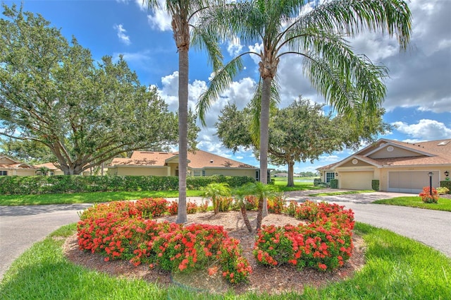 2012 Fall River Ct Unit 107, Sun City Center, FL 33573 - community / neighborhood sign featuring driveway and an attached garage