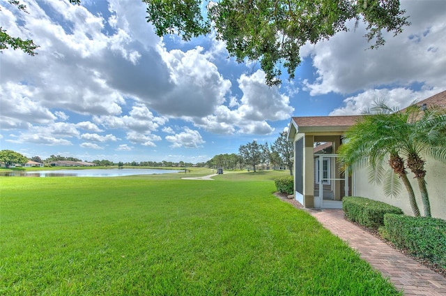 2012 Fall River Ct Unit 107, Sun City Center, FL 33573 - view of grassy yard featuring a water view