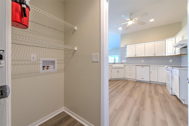 2012 Fall River Ct Unit 107, Sun City Center, FL 33573 - laundry area featuring light wood finished floors, hookup for a washing machine, a ceiling fan, and recessed lighting