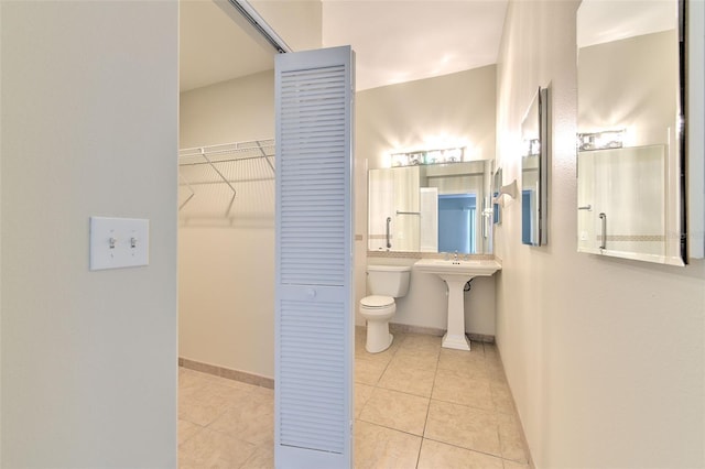 2012 Fall River Ct Unit 107, Sun City Center, FL 33573 - bathroom with tile patterned floors and toilet