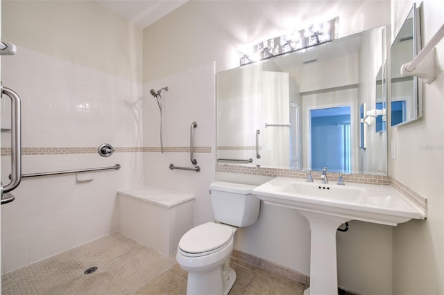 2012 Fall River Ct Unit 107, Sun City Center, FL 33573 - bathroom with a tile shower, decorative backsplash, and tile patterned floors