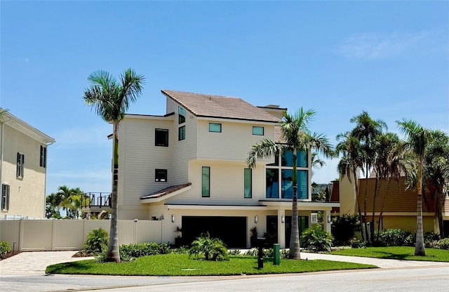 850 59th Ave, Saint Petersburg, FL 33706 - view of front of property with driveway and an attached garage