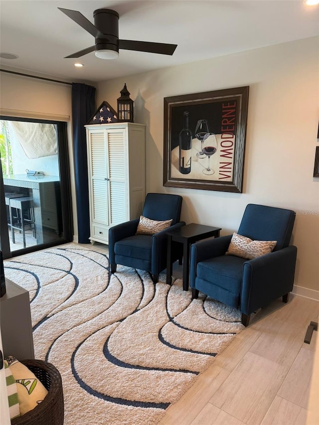 850 59th Ave, Saint Petersburg, FL 33706 - living area with a ceiling fan, wood finished floors, and recessed lighting