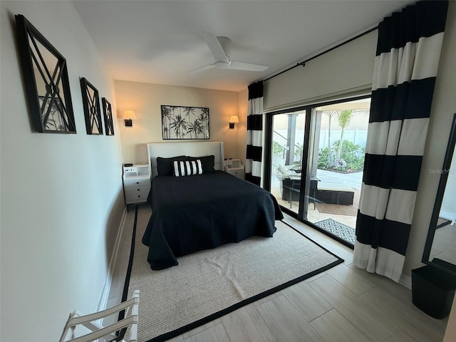 850 59th Ave, Saint Petersburg, FL 33706 - bedroom featuring access to exterior, ceiling fan, and wood finished floors
