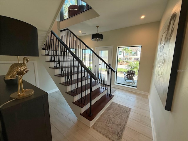 850 59th Ave, Saint Petersburg, FL 33706 - stairway with recessed lighting and baseboards