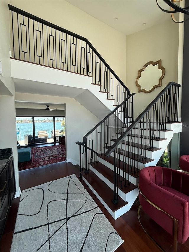 850 59th Ave, Saint Petersburg, FL 33706 - stairs with wood finished floors and a high ceiling