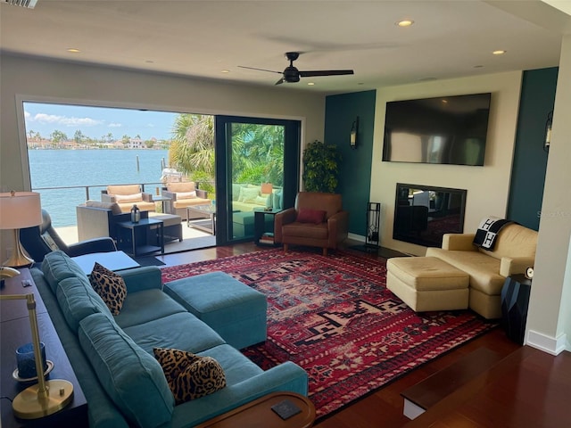 850 59th Ave, Saint Petersburg, FL 33706 - living area featuring a water view, wood finished floors, recessed lighting, and a ceiling fan
