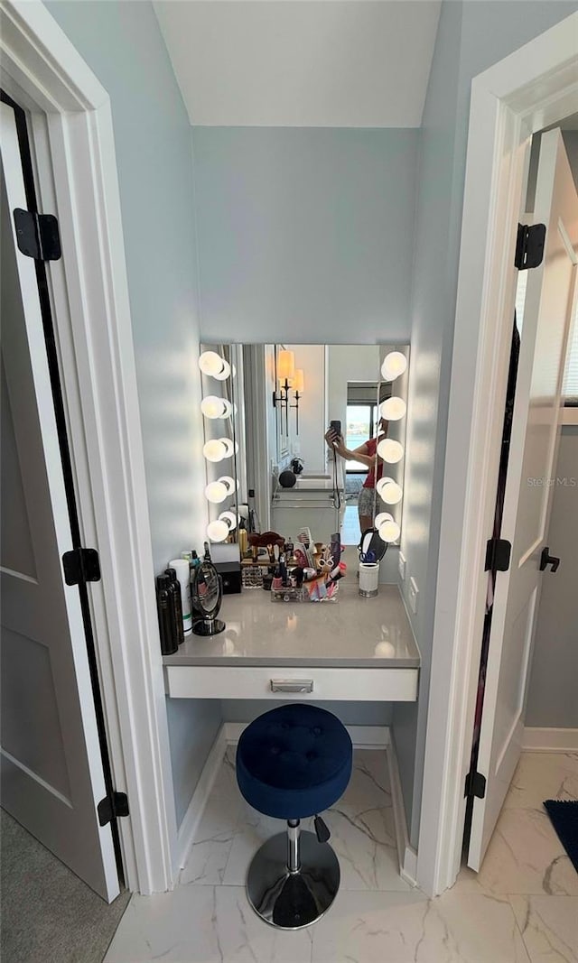 850 59th Ave, Saint Petersburg, FL 33706 - bathroom featuring marble finish floors and baseboards