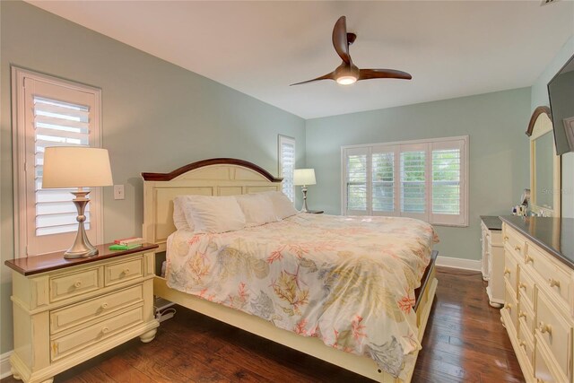 14 Evonaire Cir, Belleair, FL 33756 - bedroom with multiple windows, dark wood-type flooring, and ceiling fan
