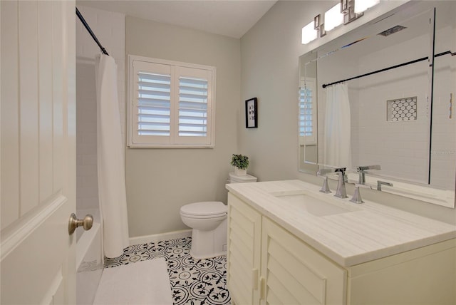 14 Evonaire Cir, Belleair, FL 33756 - bathroom featuring vanity, tile patterned floors, and shower / tub combo with curtain