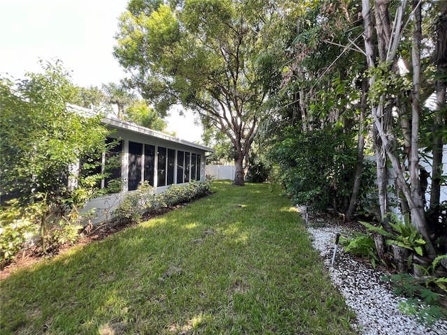 14 Evonaire Cir, Belleair, FL 33756 - view of yard with a sunroom