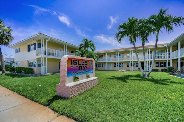 7740 Boca Ciega Dr Unit 204, St Pete Beach, FL 33706 - community sign featuring a lawn