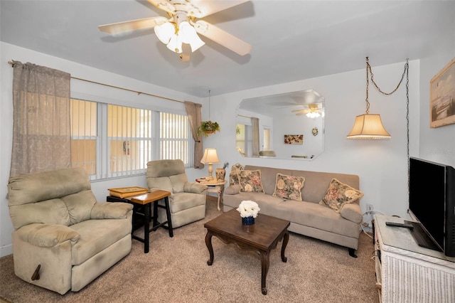 7740 Boca Ciega Dr Unit 204, St Pete Beach, FL 33706 - living room with a ceiling fan and carpet