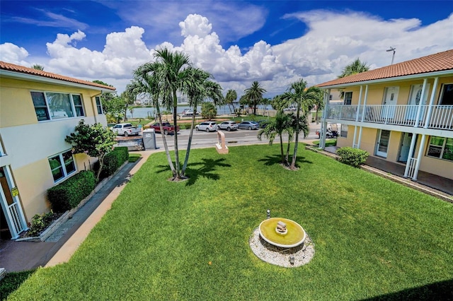 7740 Boca Ciega Dr Unit 204, St Pete Beach, FL 33706 - surrounding community with a yard