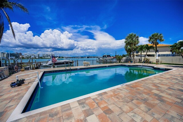 7740 Boca Ciega Dr Unit 204, St Pete Beach, FL 33706 - community pool with a patio