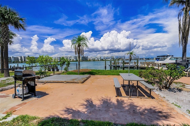 7740 Boca Ciega Dr Unit 204, St Pete Beach, FL 33706 - surrounding community featuring a boat dock and a water view