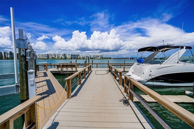 7740 Boca Ciega Dr Unit 204, St Pete Beach, FL 33706 - dock area featuring a water view