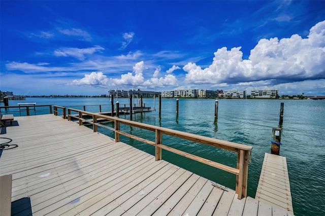 7740 Boca Ciega Dr Unit 204, St Pete Beach, FL 33706 - dock area featuring a water view