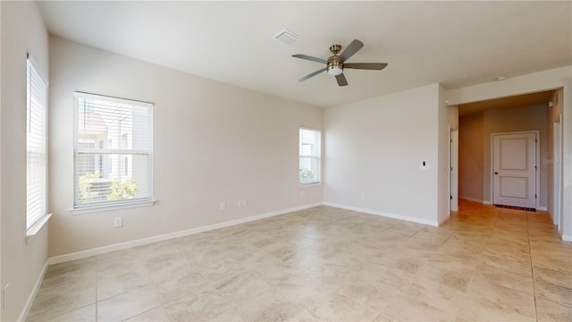 10827 High Noon Trl, Parrish, FL 34219 - unfurnished room featuring plenty of natural light and a ceiling fan