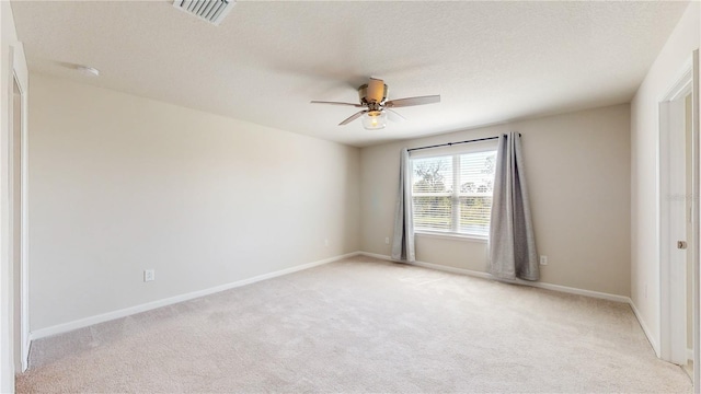 10827 High Noon Trl, Parrish, FL 34219 - empty room featuring a ceiling fan, light carpet, and a smoke detector