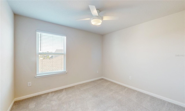 10827 High Noon Trl, Parrish, FL 34219 - unfurnished room with light colored carpet and ceiling fan