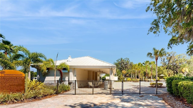 10827 High Noon Trl, Parrish, FL 34219 - manufactured / mobile home featuring a fenced front yard and a gate