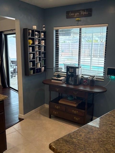 2527 Arborwood Dr, Valrico, FL 33596 - office space with light tile patterned floors and baseboards